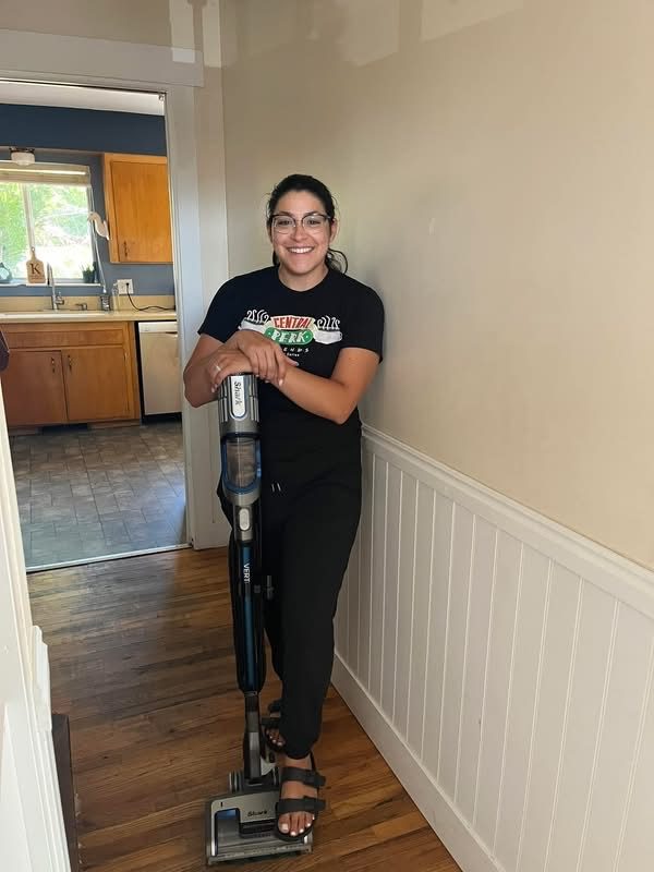 Vacuuming a hallway